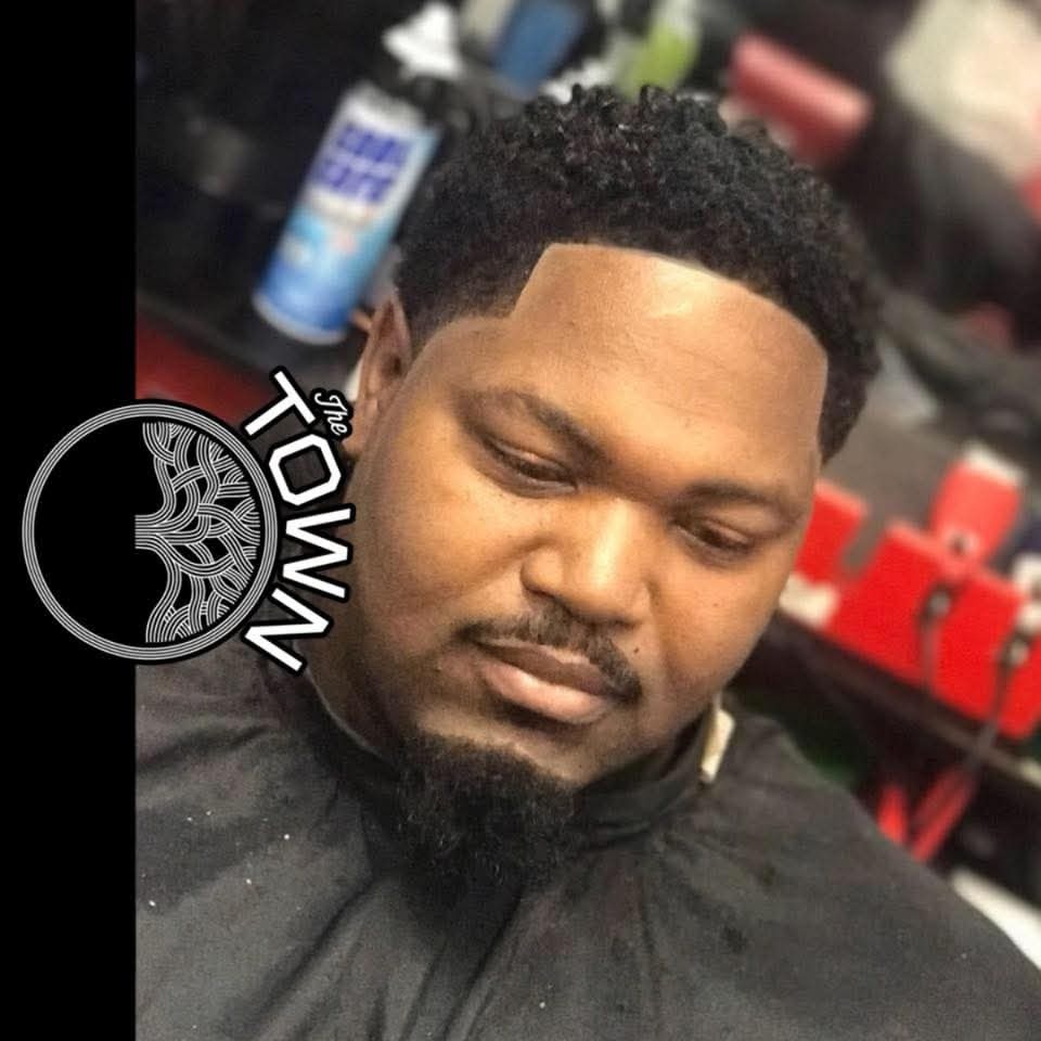 Barber Rellz portrait in the barber shop